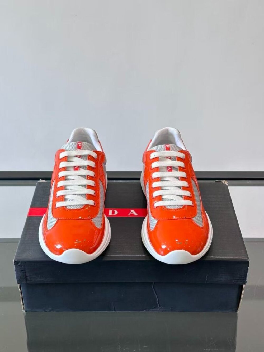 Prada Men’s Orange and White Patent Leather & Mesh Low-Top Sneakers
